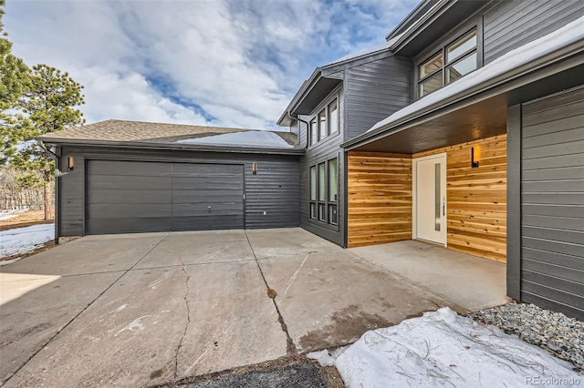 exterior space with a garage