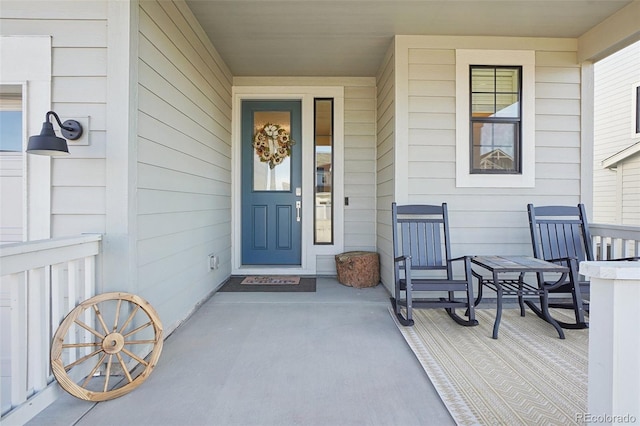 entrance to property with a porch