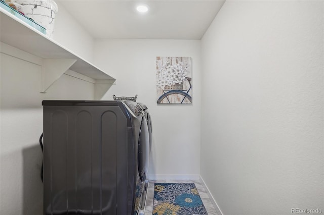 laundry room featuring washer and clothes dryer