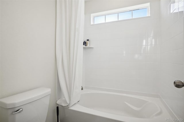 bathroom with toilet and shower / bathtub combination with curtain