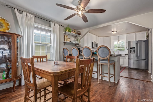 134 S 5th Ave, Brighton, CO 80601 - dining space featuring dark wood-style floors and ceiling fan