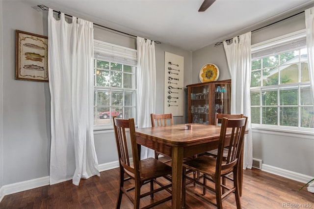 134 S 5th Ave, Brighton, CO 80601 - dining area featuring wood finished floors, plenty of natural light, and baseboards