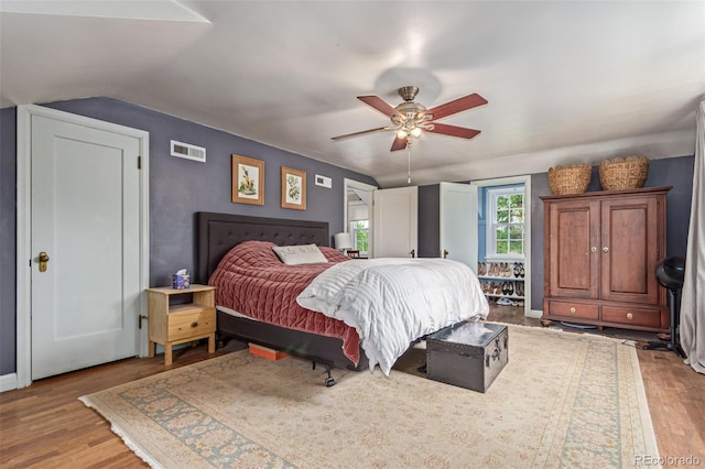 134 S 5th Ave, Brighton, CO 80601 - bedroom with wood finished floors, lofted ceiling, and a ceiling fan
