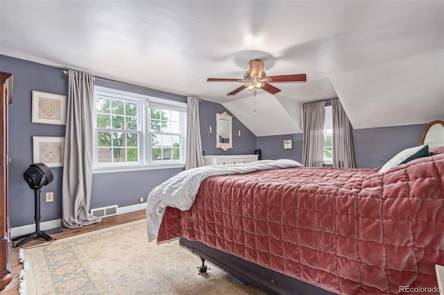 134 S 5th Ave, Brighton, CO 80601 - bedroom with wood finished floors, baseboards, vaulted ceiling, and a ceiling fan
