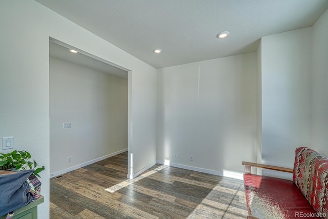 interior space with dark hardwood / wood-style flooring