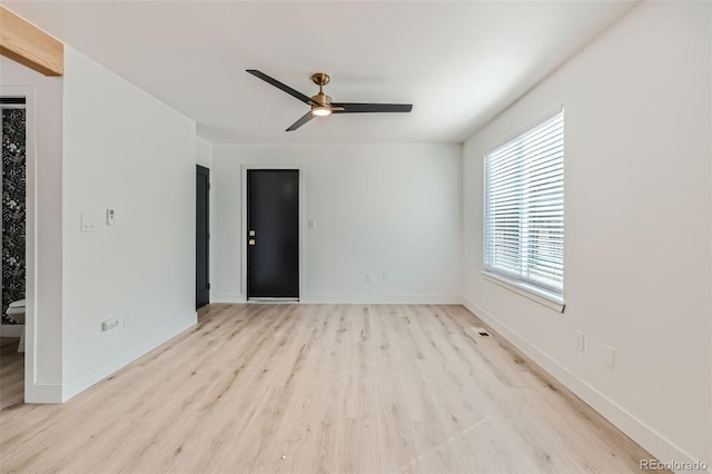 spare room featuring ceiling fan and light hardwood / wood-style floors