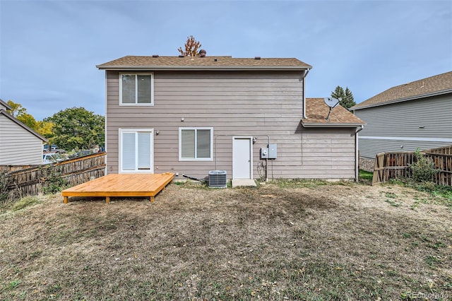 back of property featuring a wooden deck and central air condition unit