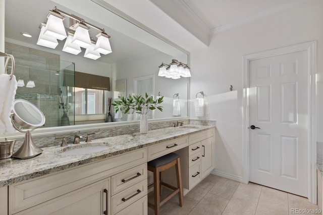 6874 Raspberry Run, Littleton, CO 80125 - bathroom featuring ornamental molding, a stall shower, tile patterned flooring, and double vanity