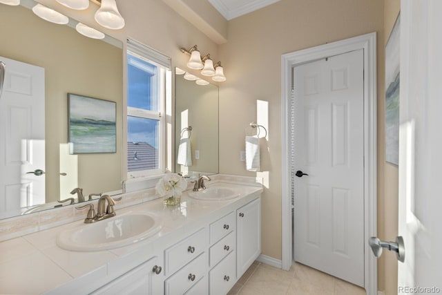 6874 Raspberry Run, Littleton, CO 80125 - bathroom featuring tile patterned flooring, ornamental molding, and double vanity