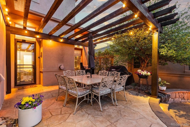 6874 Raspberry Run, Littleton, CO 80125 - view of patio / terrace with a pergola and outdoor dining space