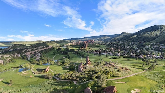 6874 Raspberry Run, Littleton, CO 80125 - view of mountain background featuring a golf club and a nearby body of water