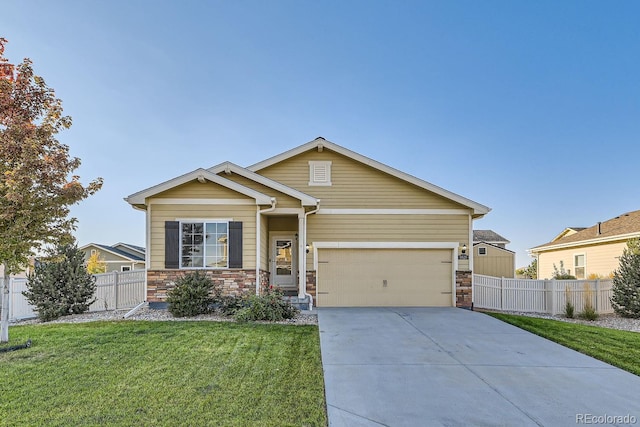 view of front facade with a front yard and a garage