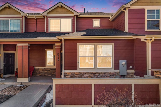 craftsman inspired home featuring covered porch