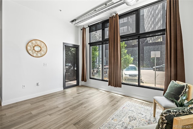 3100 Huron St Unit 1A, Denver, CO 80202 - doorway to outside with wood finished floors and baseboards