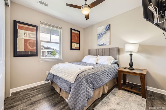 10555 Boston St, Commerce City, CO 80640 - bedroom featuring baseboards, wood finished floors, and a ceiling fan