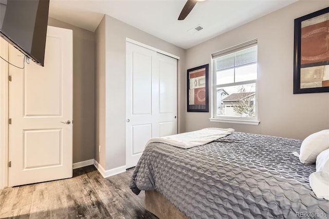 10555 Boston St, Commerce City, CO 80640 - bedroom with wood finished floors, baseboards, a closet, and ceiling fan