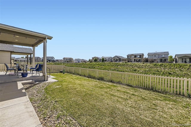10555 Boston St, Commerce City, CO 80640 - view of yard featuring a patio area and a residential view