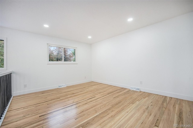 11172 W Exposition Dr, Denver, CO 80226 - empty room featuring wood finished floors, recessed lighting, and baseboards
