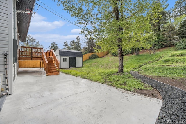11172 W Exposition Dr, Denver, CO 80226 - view of patio / terrace featuring a storage shed, an outbuilding, a wooden deck, and stairway