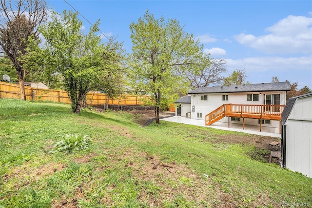 11172 W Exposition Dr, Denver, CO 80226 - view of yard featuring a patio and a wooden deck