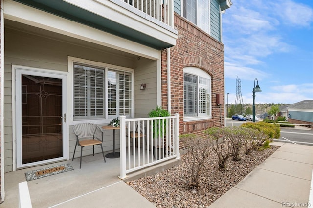 2662 S Cathay Way Unit 112, Aurora, CO 80013 - view of exterior entry featuring brick siding