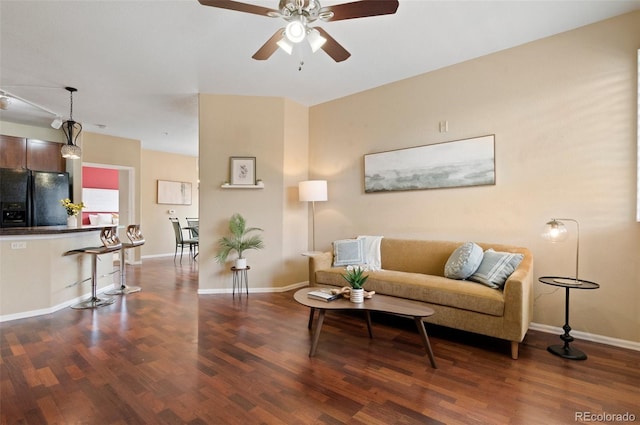 2662 S Cathay Way Unit 112, Aurora, CO 80013 - living area with a ceiling fan, wood finished floors, and baseboards