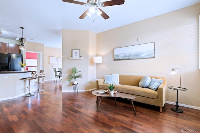 2662 S Cathay Way Unit 112, Aurora, CO 80013 - living room with wood finished floors, ceiling fan, and baseboards