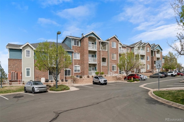 2662 S Cathay Way Unit 112, Aurora, CO 80013 - view of property with uncovered parking