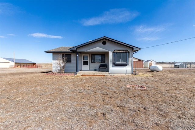 35055 E Mississippi Ave, Watkins, CO 80137 - view of front facade with a porch