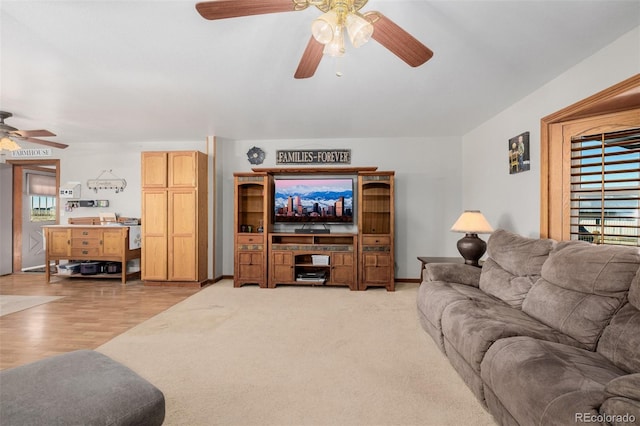35055 E Mississippi Ave, Watkins, CO 80137 - living area featuring light wood-style floors and a ceiling fan