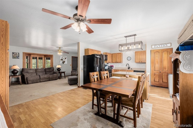 35055 E Mississippi Ave, Watkins, CO 80137 - dining room with light wood-type flooring and ceiling fan
