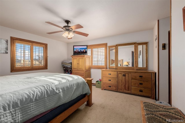 35055 E Mississippi Ave, Watkins, CO 80137 - bedroom featuring light carpet, a ceiling fan, and multiple windows