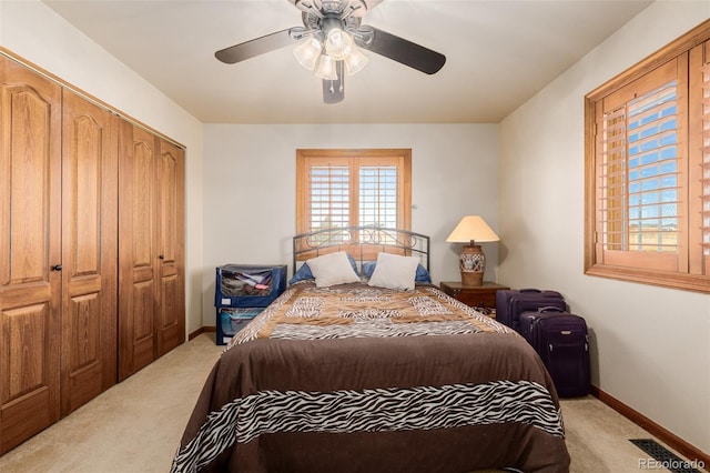 35055 E Mississippi Ave, Watkins, CO 80137 - bedroom with a closet, light carpet, baseboards, and a ceiling fan
