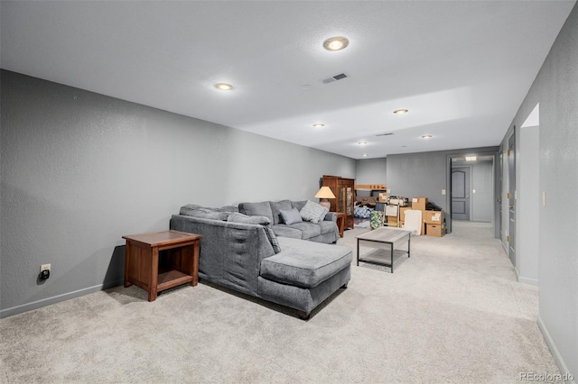 35055 E Mississippi Ave, Watkins, CO 80137 - living area featuring light carpet, baseboards, visible vents, and recessed lighting