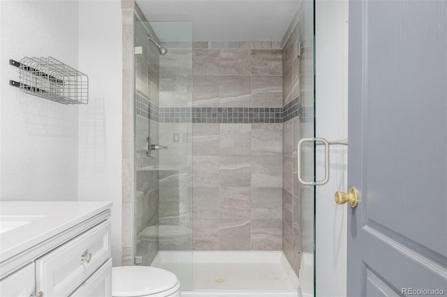 35055 E Mississippi Ave, Watkins, CO 80137 - bathroom featuring vanity, toilet, and a shower stall