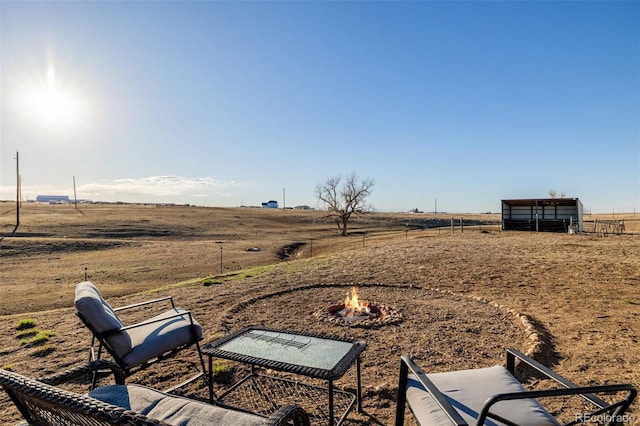 35055 E Mississippi Ave, Watkins, CO 80137 - view of yard with an outdoor fire pit, a rural view, and fence