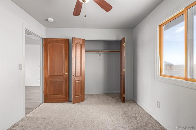 35055 E Mississippi Ave, Watkins, CO 80137 - unfurnished bedroom with carpet, a closet, baseboards, and a ceiling fan
