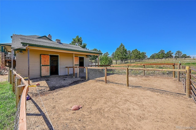 exterior space featuring a rural view