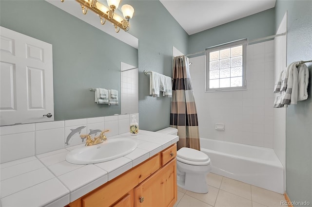 full bathroom featuring tile patterned floors, toilet, shower / tub combo with curtain, and vanity