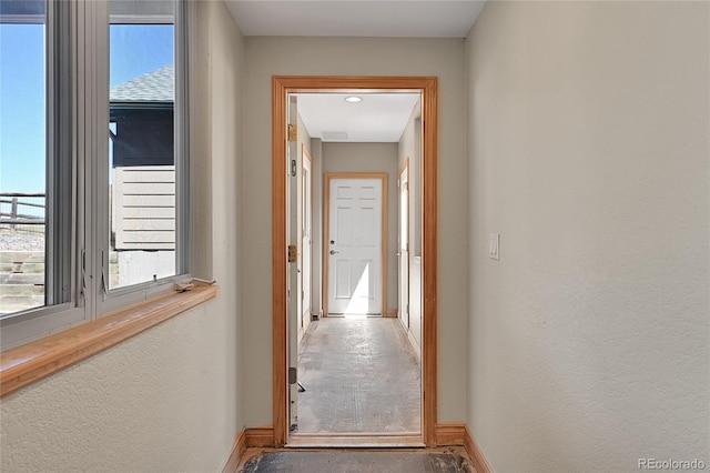 hallway with carpet flooring