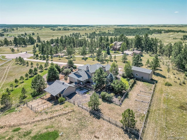 birds eye view of property featuring a rural view