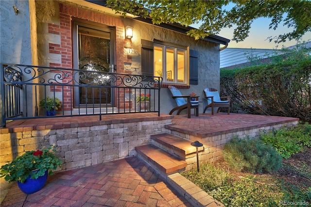 view of deck at dusk