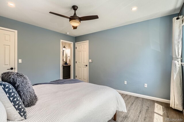 5150 Buckingham Rd, Boulder, CO 80301 - bedroom with wood finished floors, a ceiling fan, ensuite bath, and recessed lighting