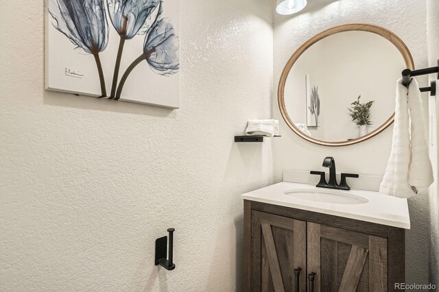 5150 Buckingham Rd, Boulder, CO 80301 - bathroom with a textured wall and vanity