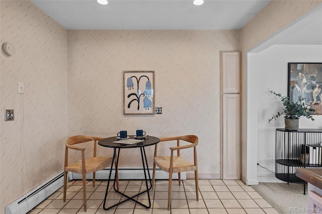 interior space featuring light tile patterned floors and baseboard heating