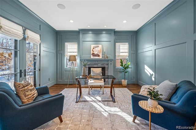 1131 S York St, Denver, CO 80210 - office featuring a decorative wall, a glass covered fireplace, recessed lighting, ornamental molding, and french doors