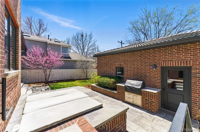 1131 S York St, Denver, CO 80210 - view of patio / terrace with fence and a grill