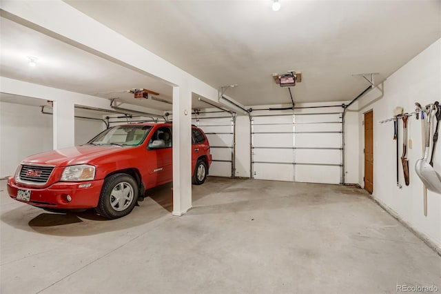 garage featuring a garage door opener