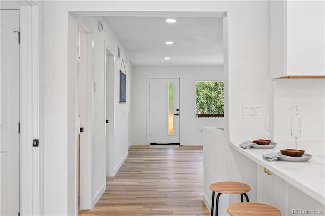 261 Knox Ct, Denver, CO 80219 - corridor featuring light wood-type flooring and recessed lighting