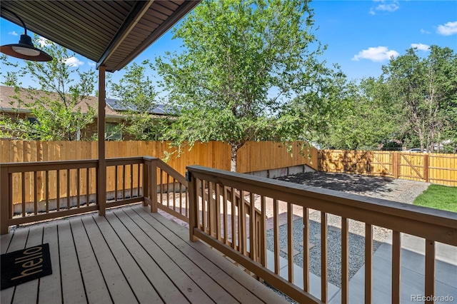 261 Knox Ct, Denver, CO 80219 - wooden deck featuring a fenced backyard